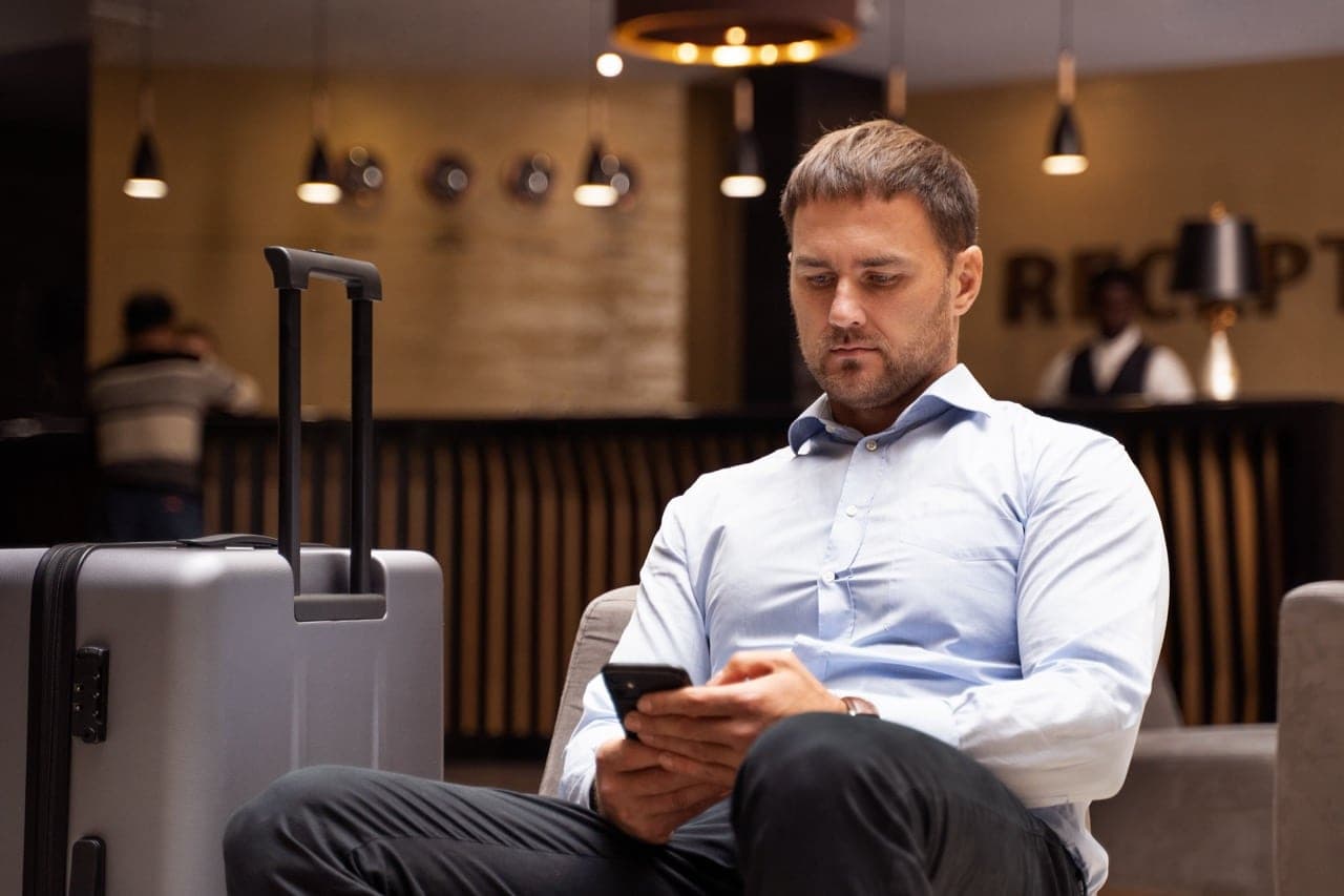 man holding smartphone
